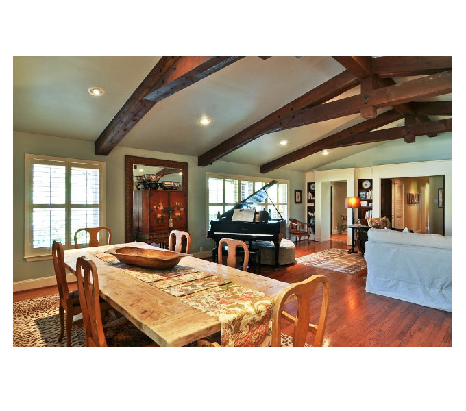 Photo of A rennovated living room and dining room to reflect this ranch style home